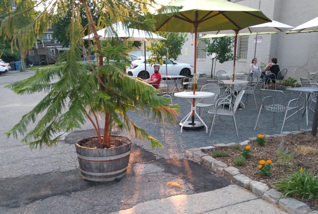 2 parking spaces turned to outdoor dining space at Common Roots