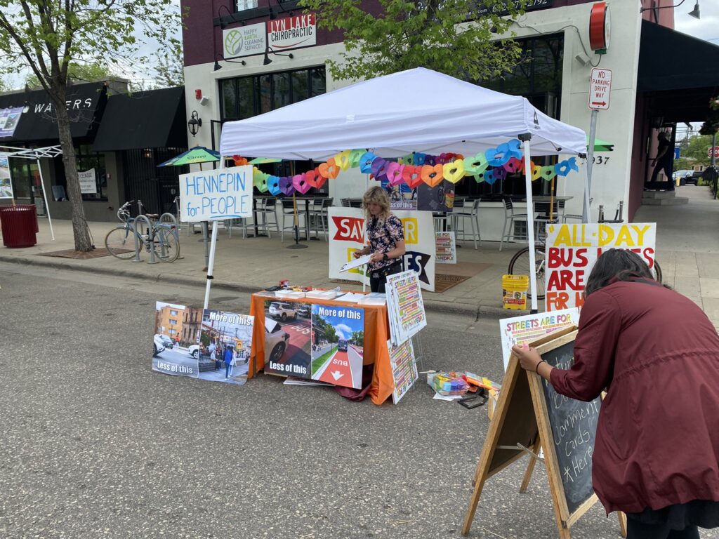 Volunteers setting up Hennepin for People Tent